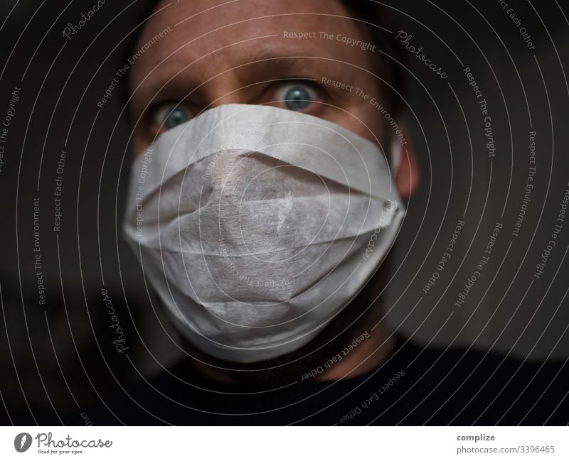 Fear of the virus | man with mouth guard corona Virus coronavirus flu Mask medicine Influenza flu virus Infection peril epedemi Epidemic risk of contagion