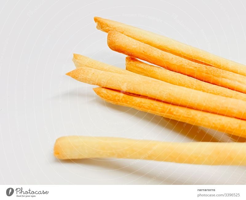 A group of Italian breadsticks isolated on a white background food snack bread stick bread sticks appetizer italian baked delicious fresh meal cuisine closeup