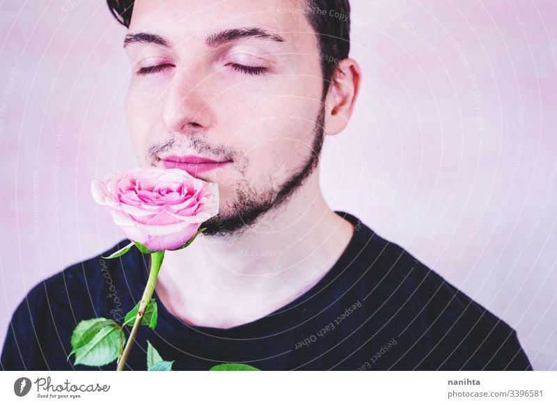 Portrait of new masculinity about a man with make up makeup male beauty gender trans transgender people real real people rose pink color flower delicate fragile
