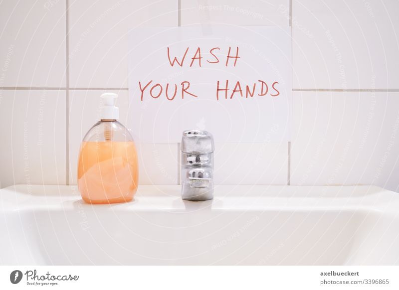 wash your hands handwritten notice above bathroom sink sign washing soap hygiene basin hand basin vanity basin washbowl washbasin washroom restroom clean