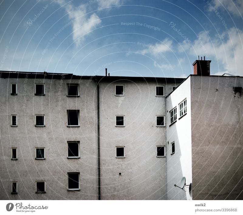 The dead eyes of Merseburg House (Residential Structure) Wall (building) Window Row Sky Blue Gray Eaves Chimney Dirty urban Deserted Roof Building Town
