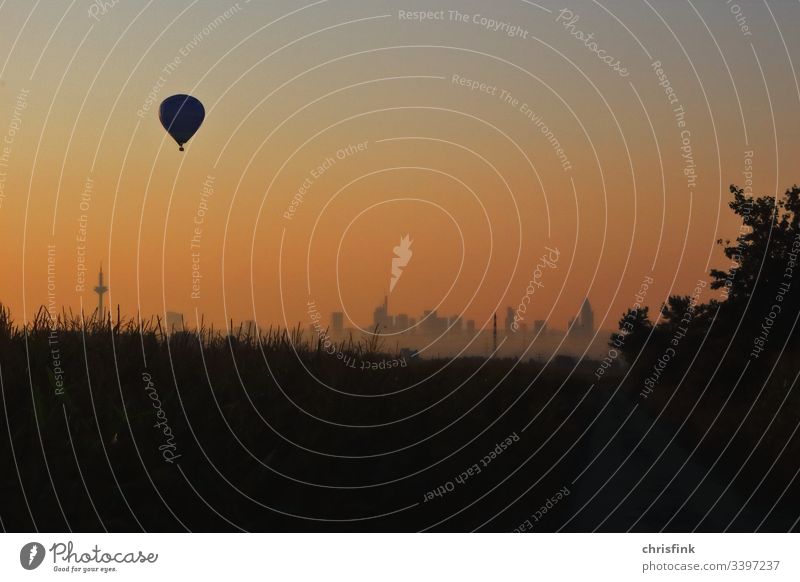 Balloon at sunrise over Frankfurt balloon hot-air balloon captive balloon aviation Flying Driving Transport Adventure free time experience Airplane Colour photo