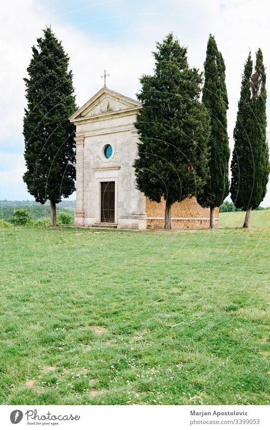 Famous church in the fields of Tuscany, Italy ancient architecture beautiful building cappella catholic chapel christian countryside cypress europe faith famous