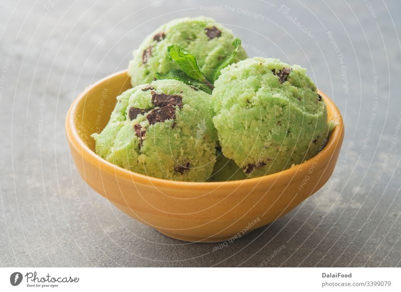 Ice cream with mint and chocolate chip background ball bowl close up creamy dairy dessert flavor flavour food frozen gelato green homemade ice ice-cream