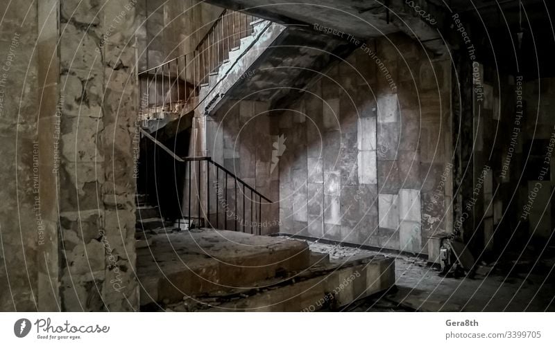 stone steps of a staircase inside an abandoned building in Chernobyl Ukraine Accept accident broken catastrophe contaminated contamination damage damaged danger