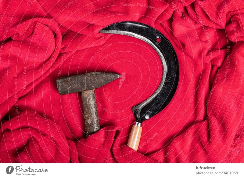 Hammer and sickle wrapped in a soft, red fleece blanket Red policy Politics and state Symbols and metaphors Communism Sign Tool Russia Socialism Might Past