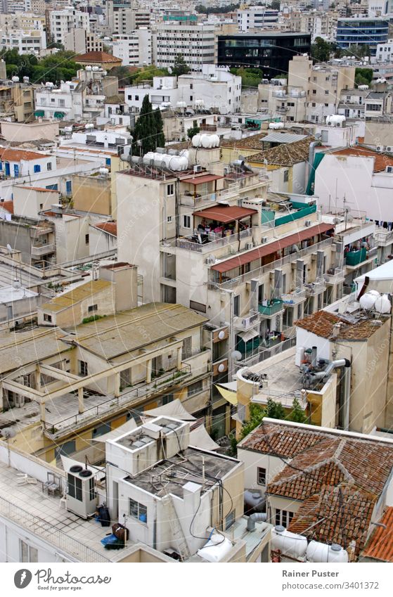 View over the roofs and skyline of Nicosia, Cyprus Roof rooftop Skyline houses house roof Mediterranean Exterior shot Deserted Town Day Vantage point