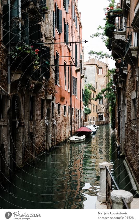 View of the rustic architecture of Venice, Italy canal alley alleyway ancient antique beautiful boat building city cityscape colorful destinations europe
