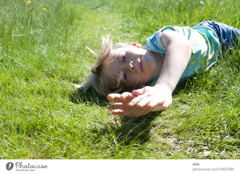 Grass rolls! Boy (child) Roll Nature Summer Infancy game slope Meadow Field Landscape Green Colour photo fun Joy Outdoors Child Lifestyle Happiness Happy