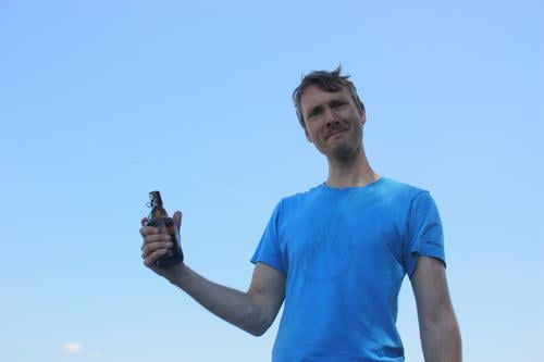 Man drinking beer Beer Drinking after-work beer Neutral background Summer free time Beverage Bottle Alcoholic drinks Party Exterior shot Feasts & Celebrations