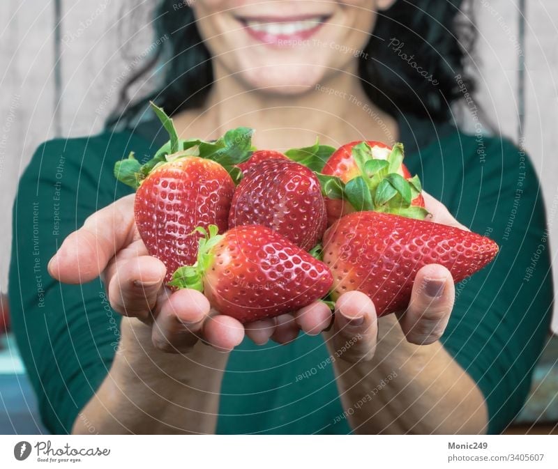 Human hands offering strawberries Strawberries spring tasty supplements food holding diet dessert fingers vitamin nutritionist tropical tangerine natural