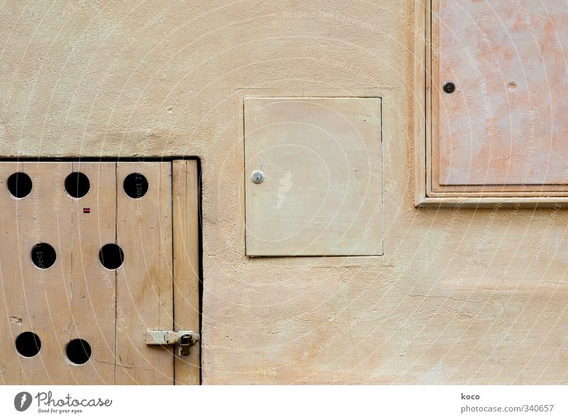 three squares House (Residential Structure) Wall (barrier) Wall (building) Facade Door Lock Hollow Circle Rectangle Concrete Wood Sharp-edged Simple Round