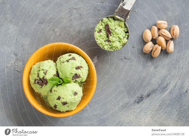 Ice cream with pistachio and chocolate background ball bowl cold creamy dairy decorated delicious dessert flavor food frozen fruit green homemade ice ice cream