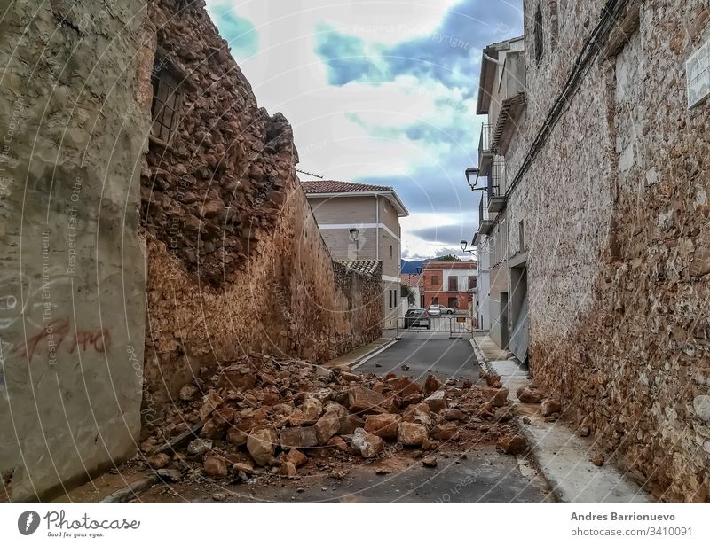 Collapse of an old stone house city building village architecture outdoor nature insurance blue unprofitable damage break off cost breakdown apartment travel