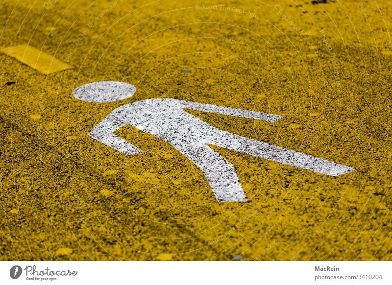 Pedestrian Pictogram pictogram Road marking Direction Information Signage visualization stylized symbol Asphalt Street tarred road Yellow nobody Copy Space