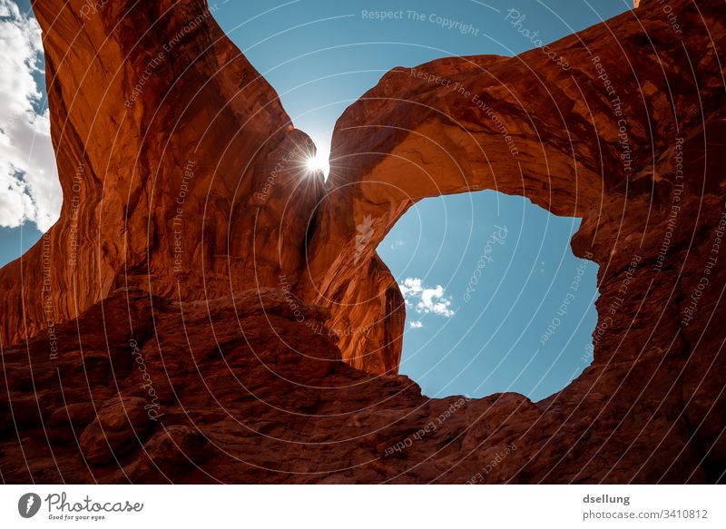 orange coloured arcs with sunlight and blue sky in the background Adventure Shadow Light Sunlight Sky Summer Vacation & Travel Desert Americas Arizona Earth