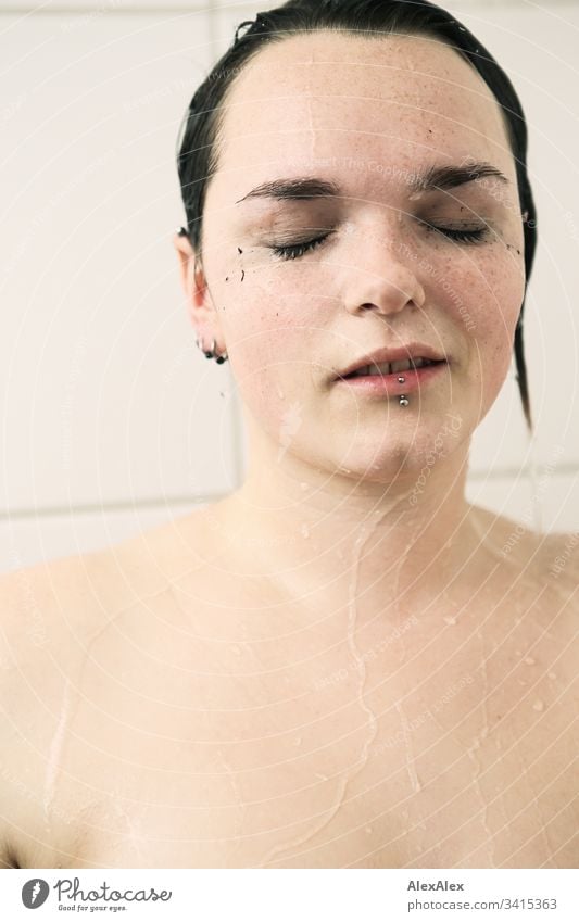 Portrait of a young woman in the shower lingerie Underwear Point Low neckline Femininity Copy Space right Copy Space left Forward Portrait photograph