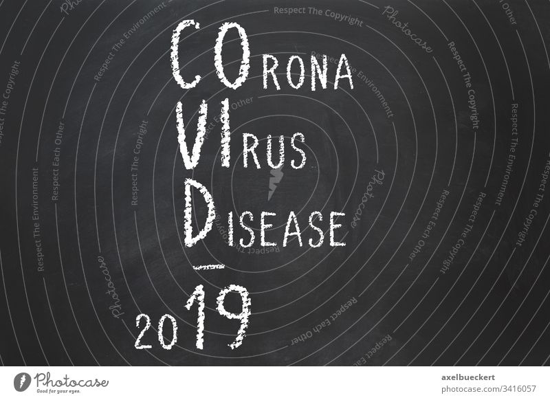 Corona virus disease Covid-19 acronym explained corona covid-19 coronavirus name abbreviation chalk text chalkboard blackboard explanation pandemic outbreak