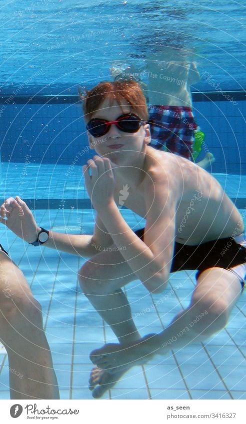 Boy dives happily in the swimming pool Boy (child) Swimming pool Child Swimming & Bathing Summer Water Dive Underwater photo Playing Blue Blow Joy Aquatics Air