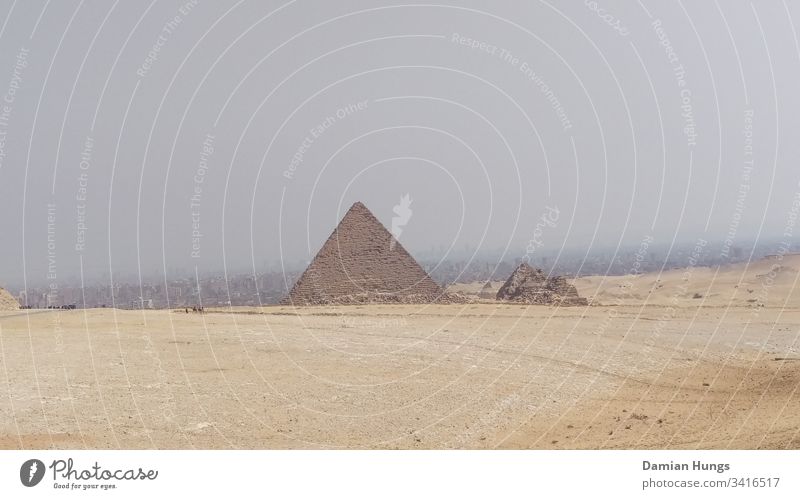 Pyramid before Cairo Desert; Cairo; Egypt Sky Giza Sand Exterior shot Pharaohs Landmark Architecture