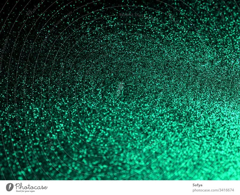 Glitter mint green abstract background with shine glitter emerald bokeh christmas shiny festive new year metallic surface night stars elegant lights color