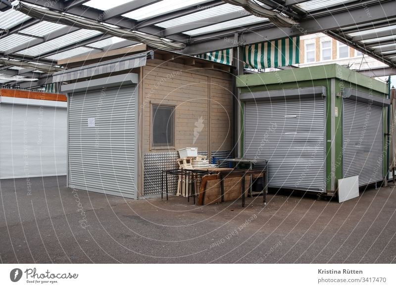 closed market stalls Markets market stands Market stall booths Marketplace Closed too Roller shutter roller shutter shutters Closing time opening hours