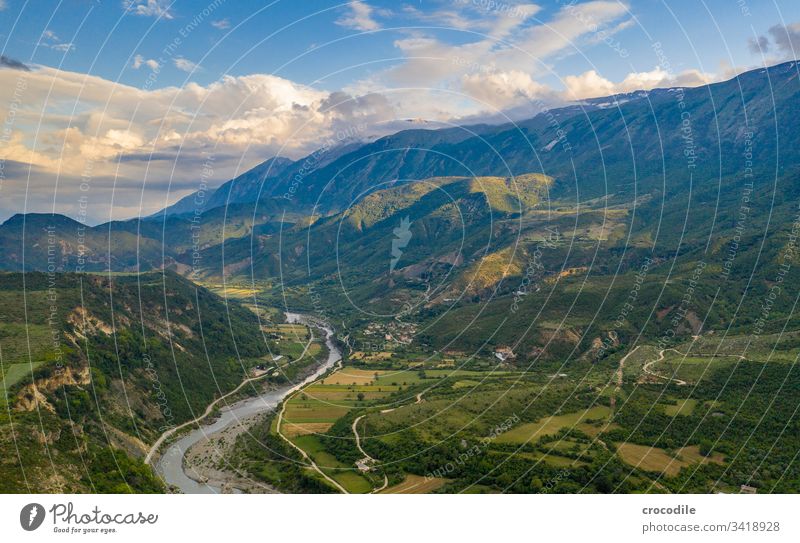 Albania Vjosa Valley wild river Wilderness Mountain Calm Peaceful Nature road trip UAV view fields agriculture houses peasants Landscape Environment