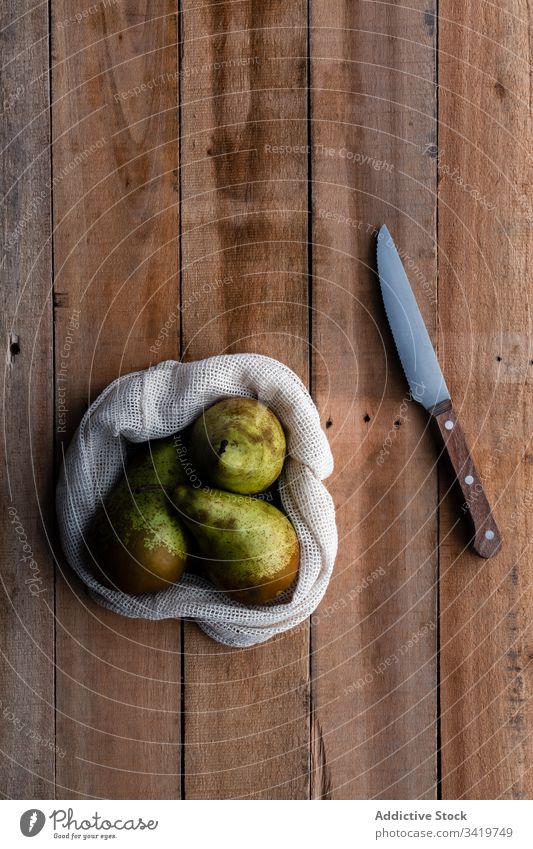 Cotton bag with ripe pears rustic table wooden cotton eco friendly food organic fresh healthy fruit zero waste sack natural juicy grocery vegetarian vitamin