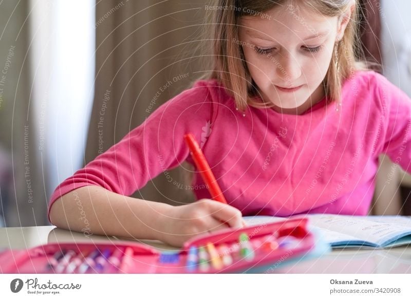 Home schooling concept, quarantine. Girl doing homework. academic background book caucasian child childhood class computer coronavirus course cute degree