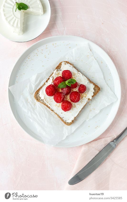 Toasted bread with fresh cheese and strawberries slice strawberry delicious food healthy breakfast lunch gourmet sandwich meal toast fruit sweet from above