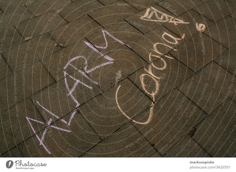 Symbolic chalk painting ALARM CORONA Alarm Dangerous Virus Corona virus coronavirus coronavirus SARS-CoV-2 corona crisis symbolic Chalk drawing