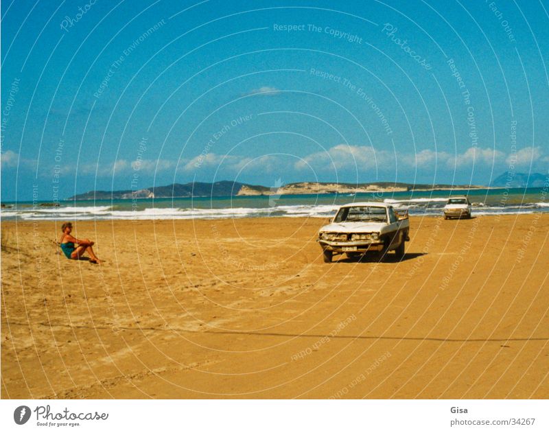My car, the sea and you. Ocean Sandy beach Woman Car Coast Pick-up truck Far-off places Atlantic Ocean Relaxation Copy Space top Blue sky Copy Space bottom