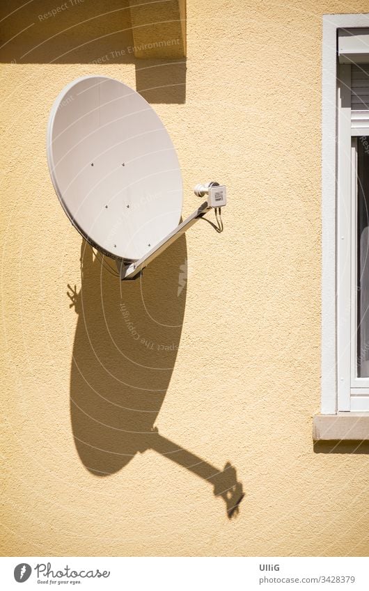 Satellite dish on house wall Satellite Dish Receive transfer Antenna bowl satellite reception Radio medium news entertainment Radio (broadcasting) TV technology
