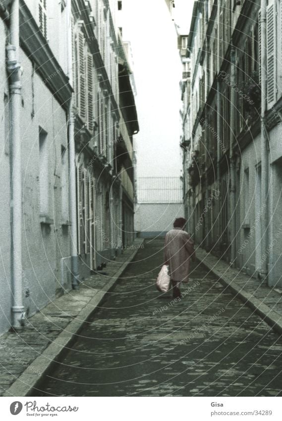 An old woman in Paris Loneliness No through road Town Woman Old End Lanes & trails Street Death