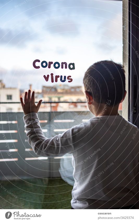 Little boy in confinement for the Coronavirus pandemic 2019-ncov care child corona virus coronavirus covid covid 19 covid-19 disease epidemic equipment face flu