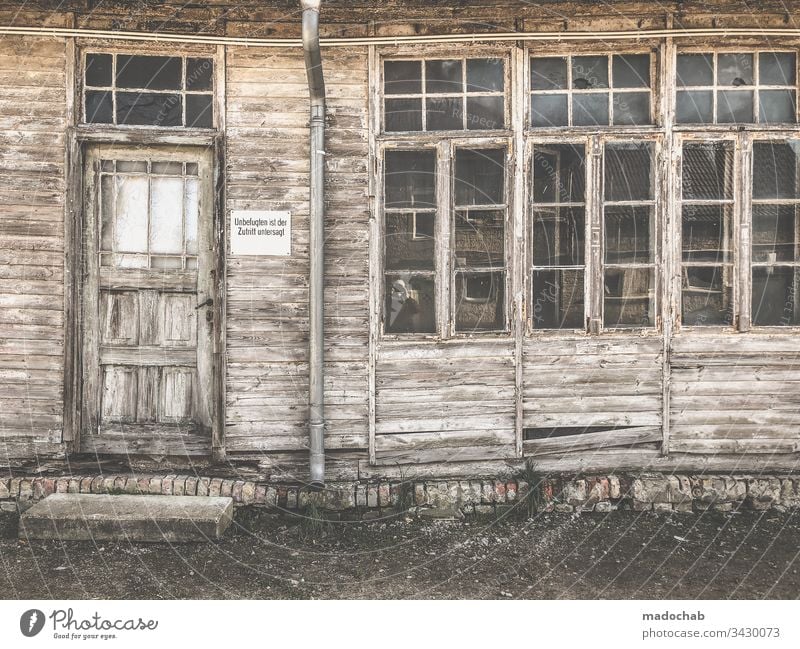 Ruined and weathered house facade Ruin House (Residential Structure) Wood boards Broken corrupted Facade Decline Destruction Wall (building) Window Redecorate
