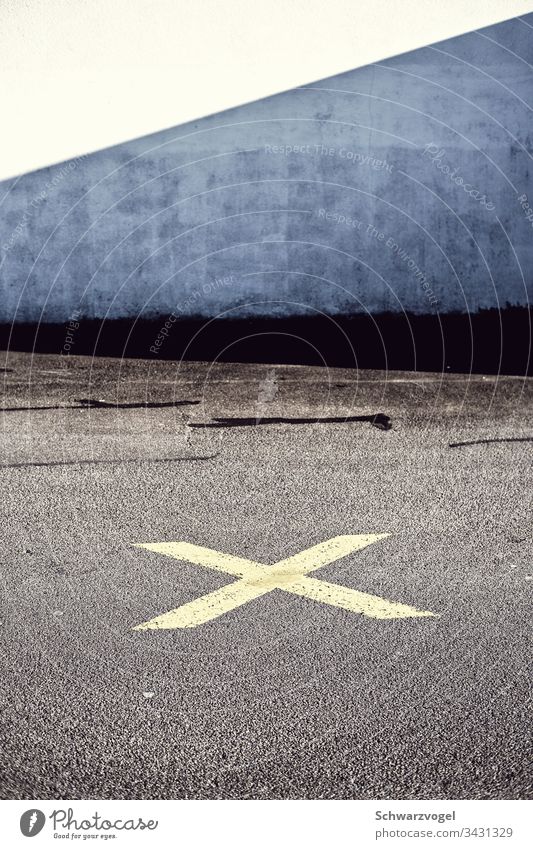 An X on the road Treasure Asphalt Shadow play mark Street Lane markings Sign Orientation Clue