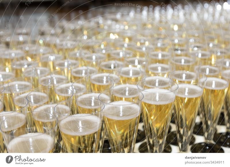 Many glasses of champagne on the table alcohol anniversary background beverage celebration closeup cocktail crystal drink event festive glassware group liquid