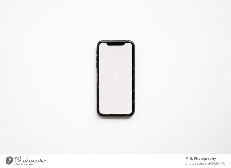 A smartphone isolated on a white background Internet PDA Cellphone Neutral Background Studio shot Transmit Screen Display Information Spark replace Connect