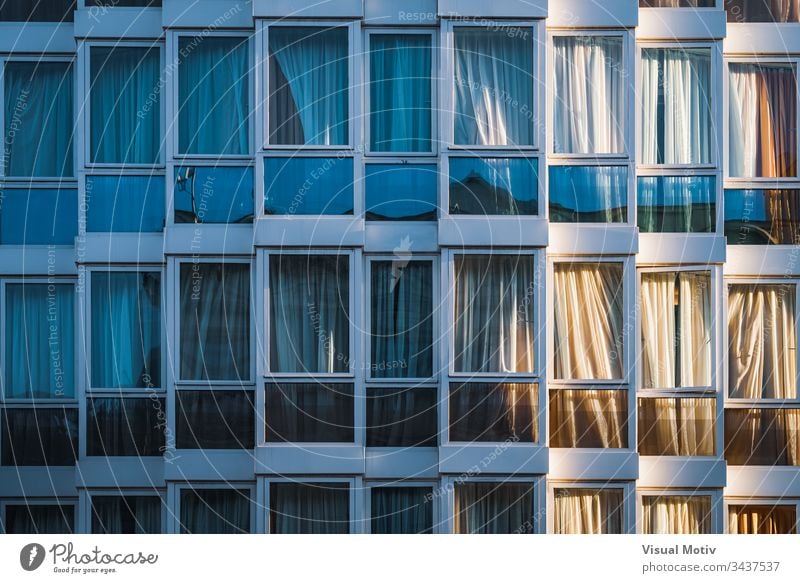 Eclectic glazed facade of an urban building windows architecture architectural architectonic apartment residential metropolitan constructed edifice structure