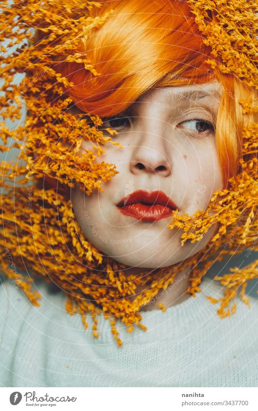 Moody portrait in orange tones of a white woman close up redhead redhair art artistic mood moody studio expression expressive beauty beauty photography