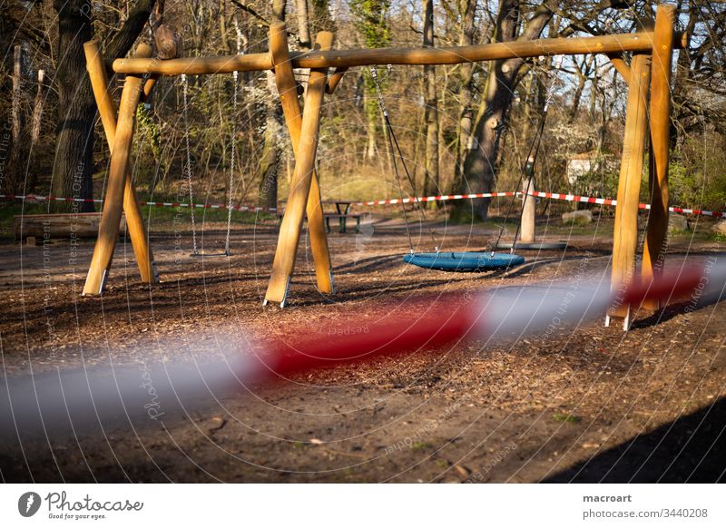 Playground ban - Corona Virus 2020 Playground prohibition corona Hall Germany covid19 output lock cordoned off barrier tape Red White Close-up Playing children