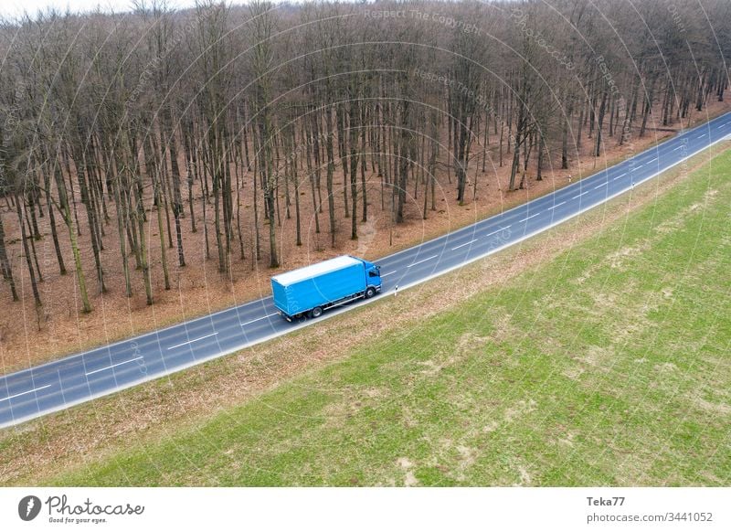 a truck on a country street from above modern truck truck transportation modern transportation street transportation street with a truck truck driving