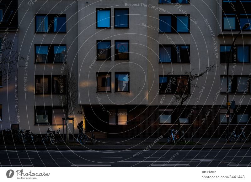 light Light Shadow Town House (Residential Structure) person Woman Street City Transport Bicycle Life Exterior shot Day Human being
