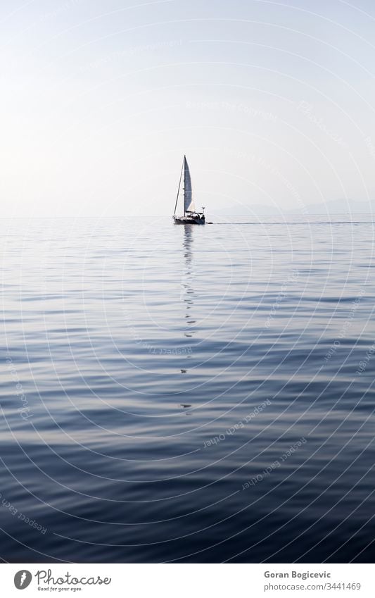 Sailing boat on a calm sea surface maritime mediterranean yachting outdoors day seascape marine wave travel sailboat nature water ocean tourism summer sport