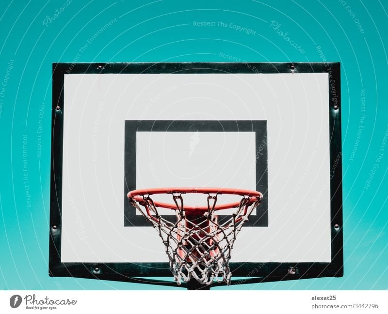 Basketball hoop on green background athletic backboard basket basketball circle competition court dunk equipment game indoor isolated net object play rim ring