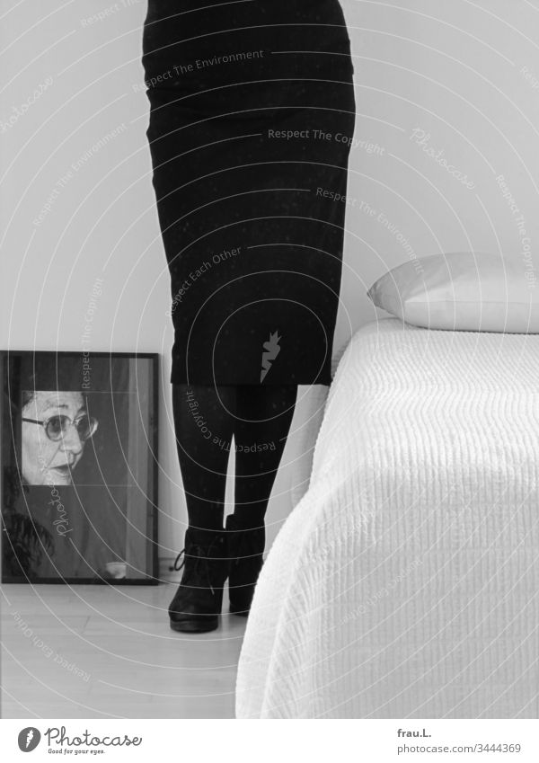 There she stood between her bed and the picture of her mother and felt safe. Woman photo Legs Image Bed Bedroom Cushion Interior shot Skirt bootees