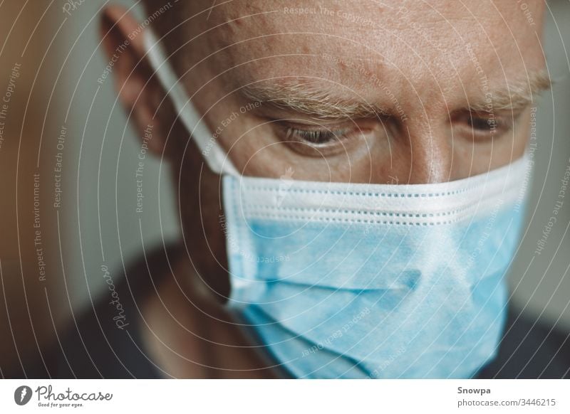 Portrait of a man wearing a surgical mask medical young health protection care male people person white protective portrait adult isolated medicine face