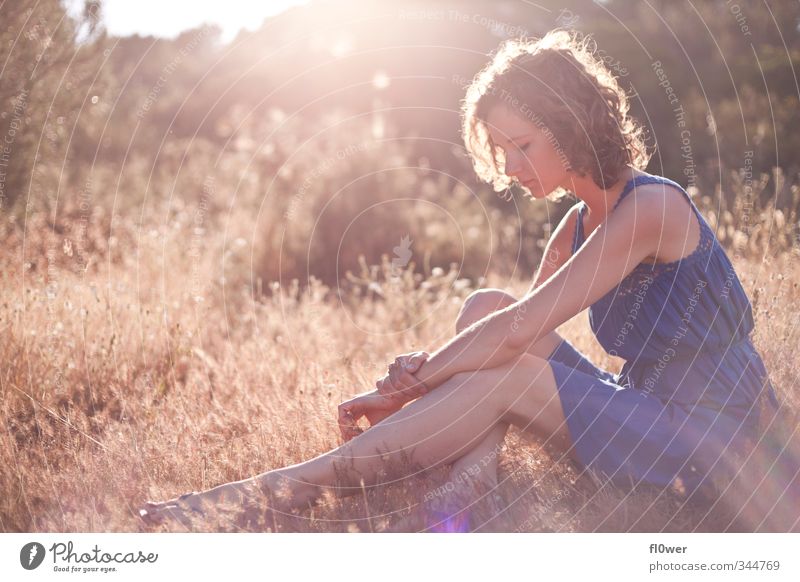 sun absorption Body Summer Human being Feminine Girl Young woman Youth (Young adults) Adults 1 18 - 30 years Nature Grass Bushes Sit Wait Blue Yellow Gold