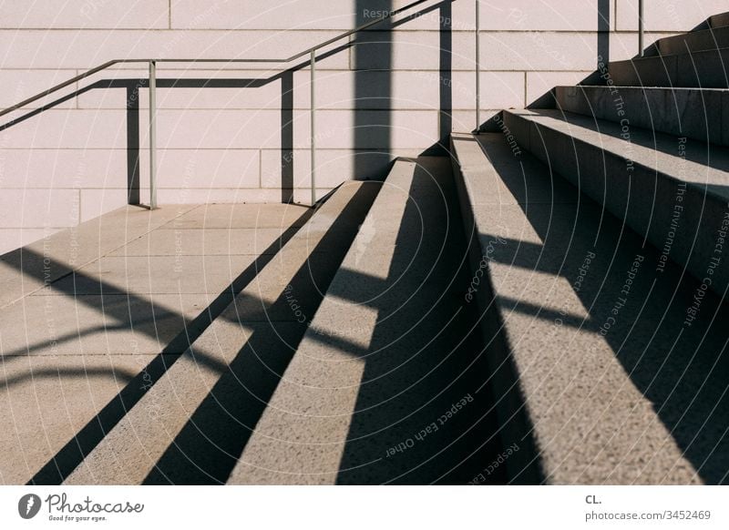staircase Stairs Banister handrail Sharp-edged Concrete Stone Deserted Exterior shot Colour photo Day Architecture Wall (building) Wall (barrier) Subdued colour